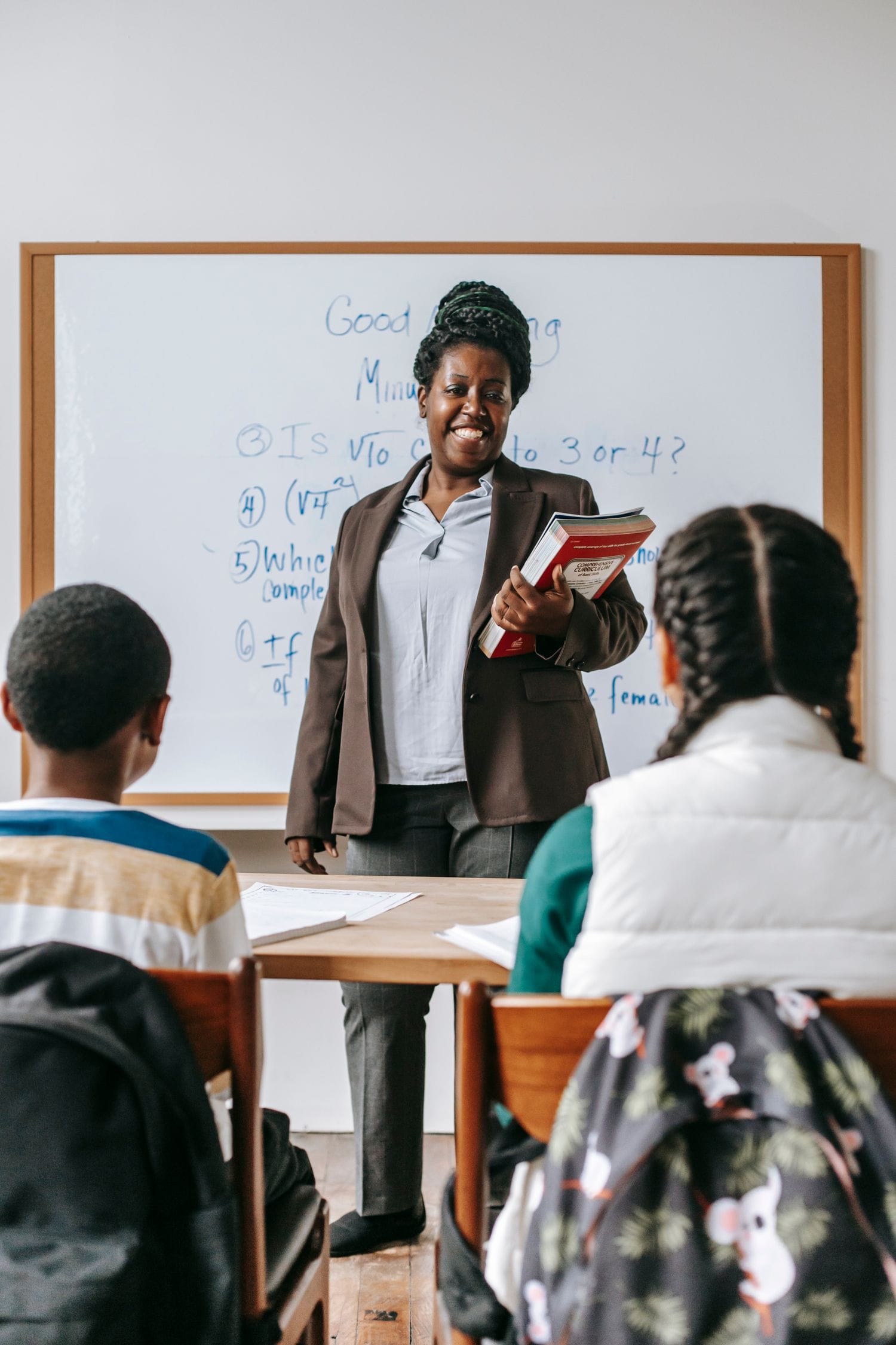Educator teaching students in a classroom