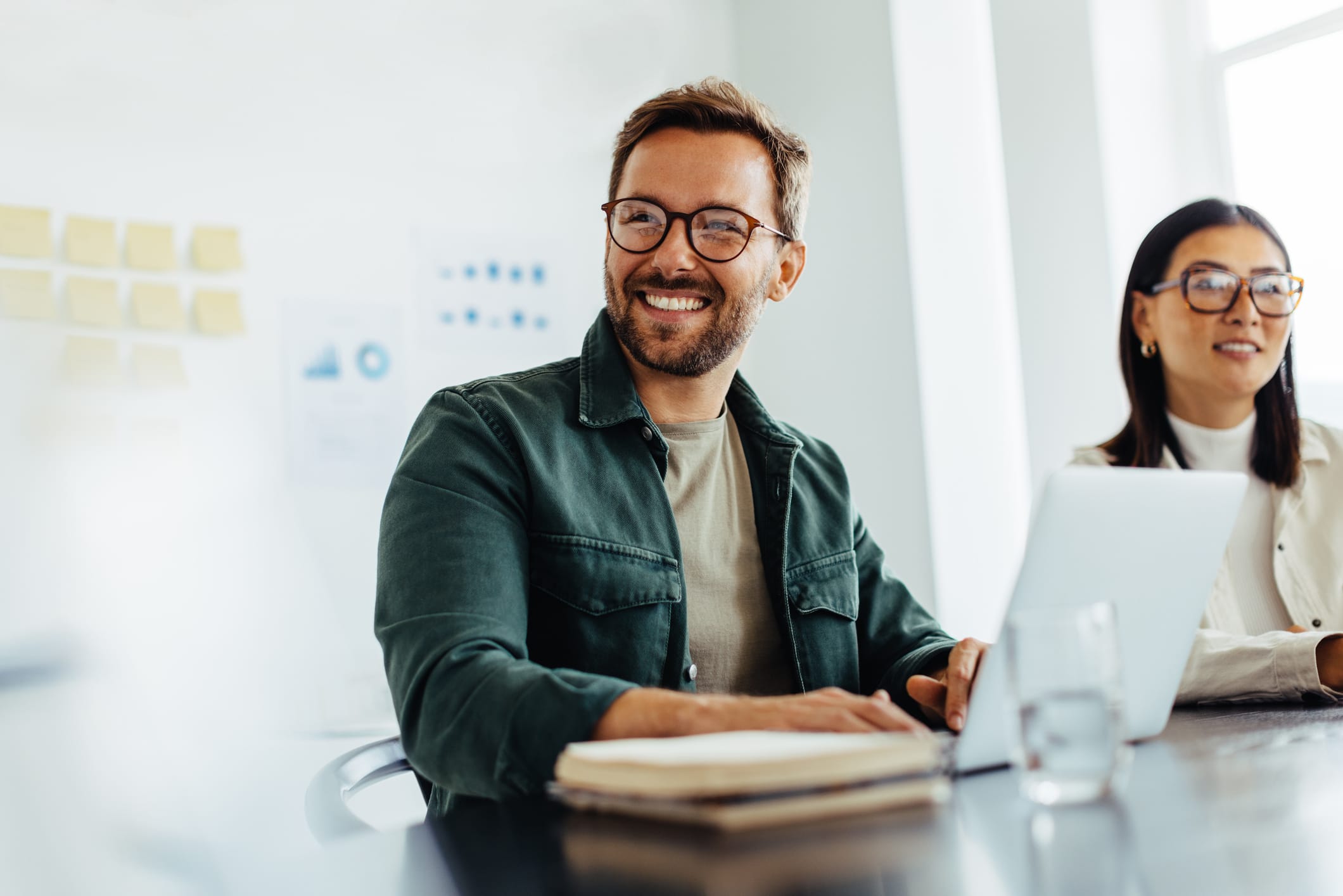 two educators sitting in an office working