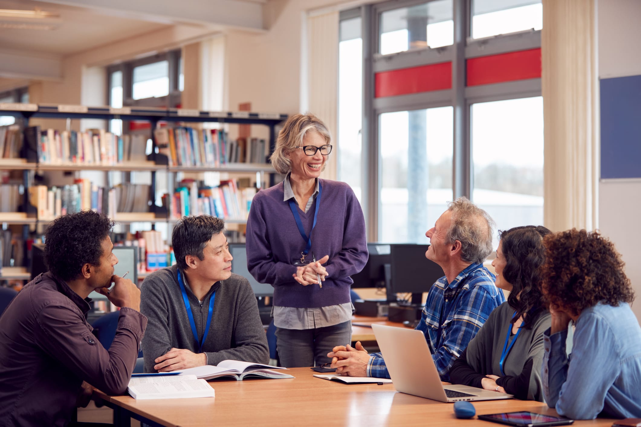 educators meeting in library