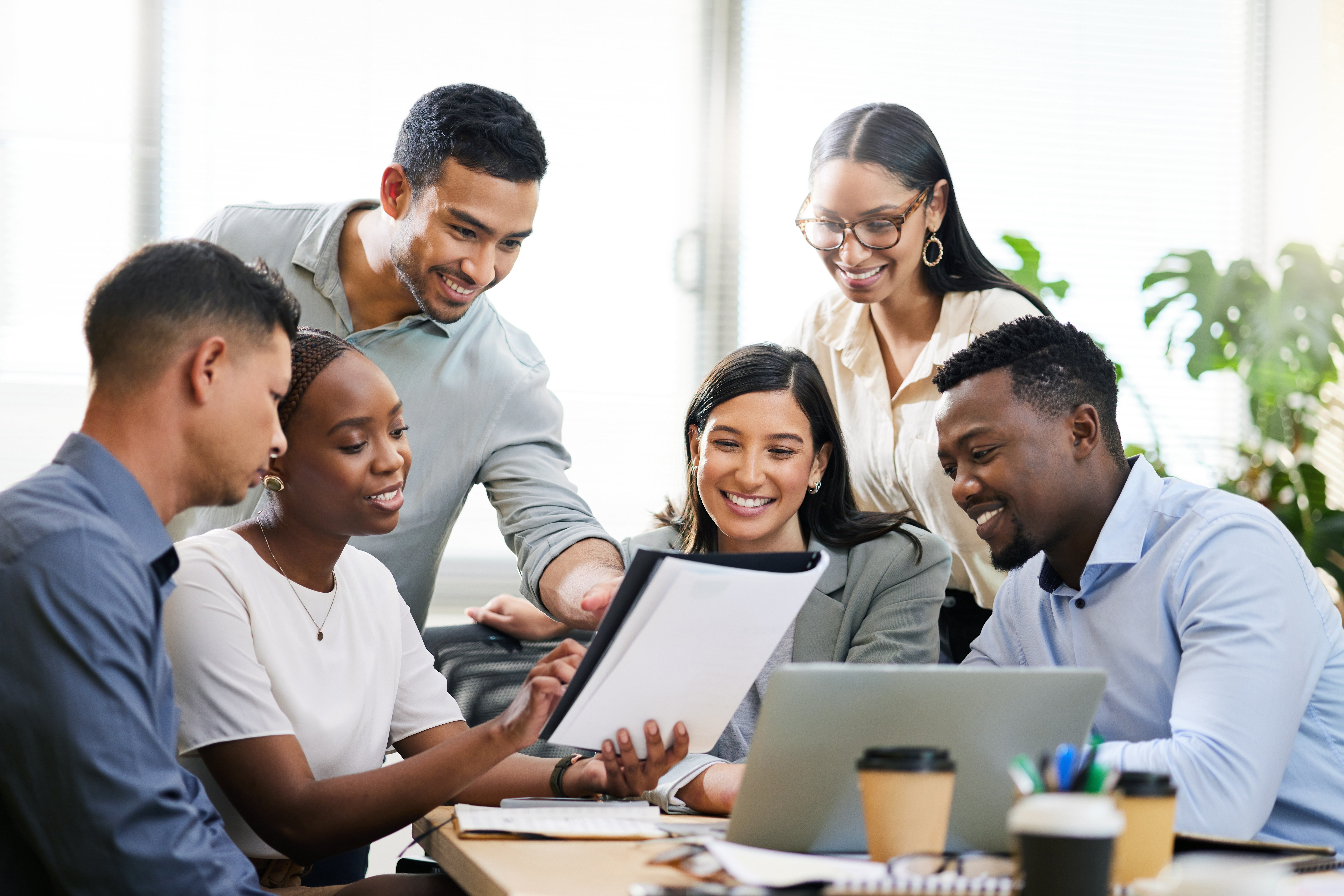 Educators reviewing a funding document